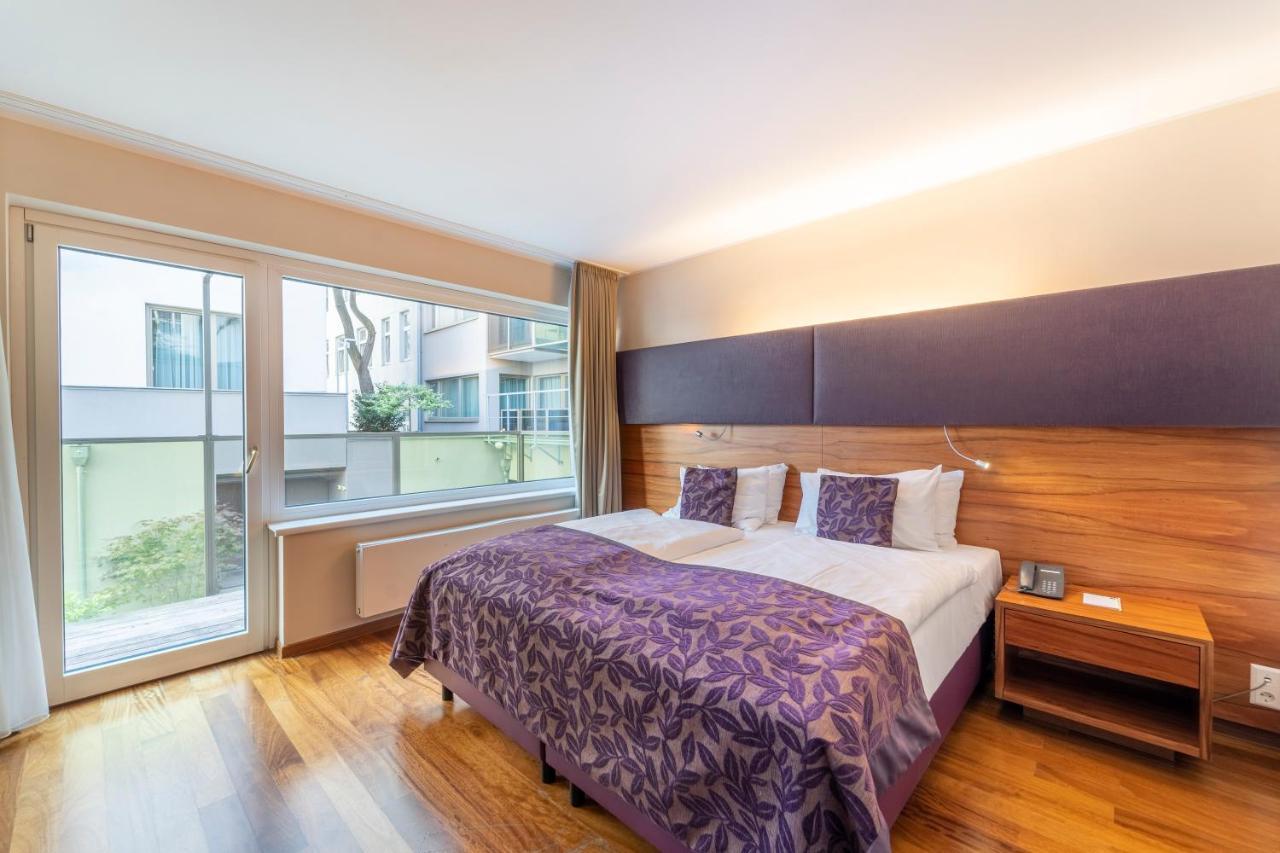 Pakat Suites Hotel Wina Bagian luar foto