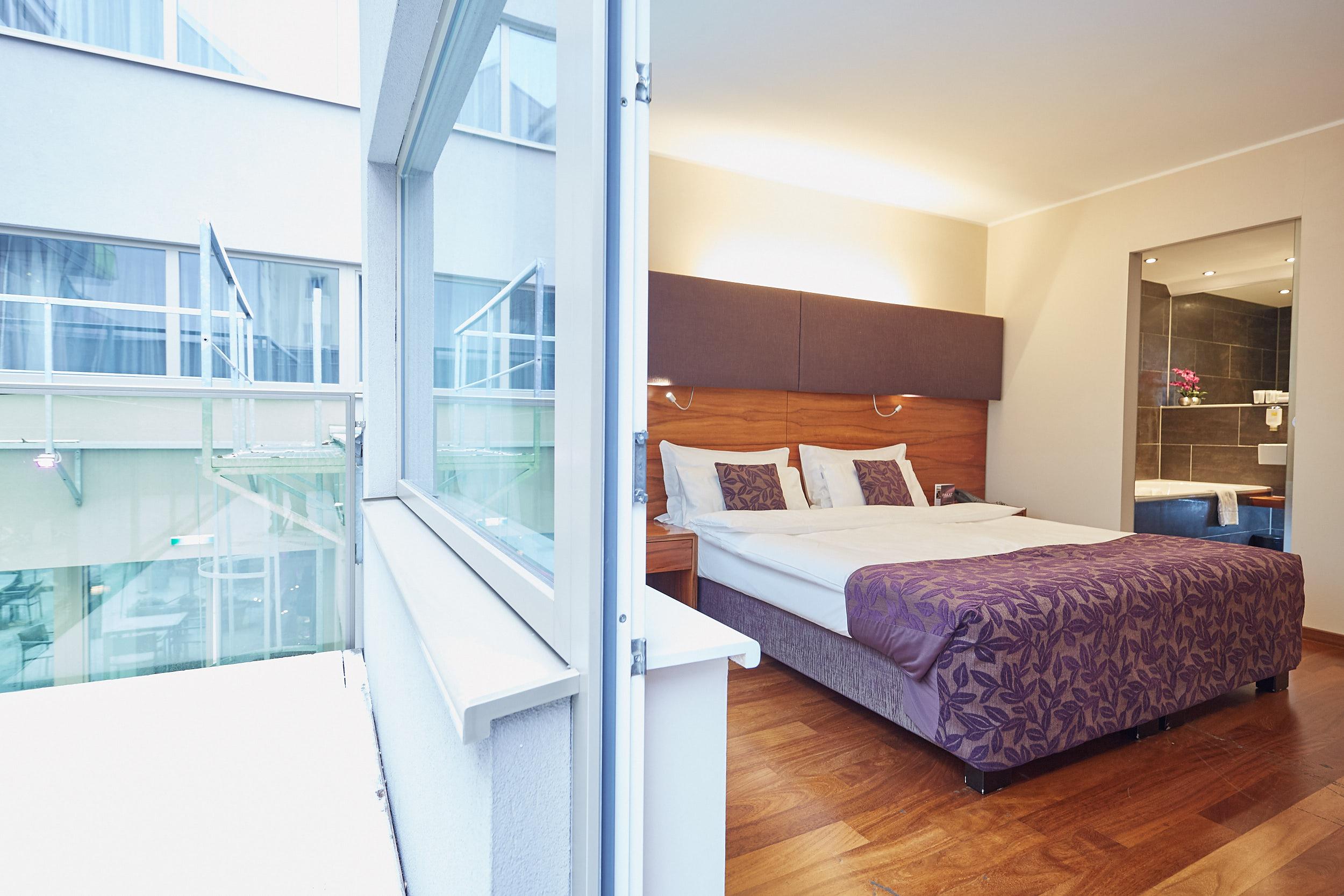 Pakat Suites Hotel Wina Bagian luar foto